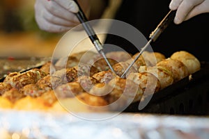 Takoyaki is a most famous Japanese snack food