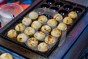 Takoyaki is a snack of Japan. And is also popular in Thailand