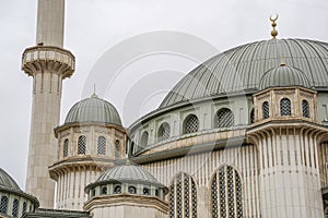 Taksim Square Mosque in front of Republic Monument Istanbul Turkey photo