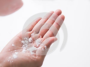 Talcum to Hand on white background photo