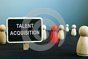 Talent acquisition strategies sign and  figurines. HR management concept