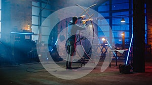 Talented Innovative Artist Working with Metal Tube Sculpture, Wearing Safety Glasses and Uses an A
