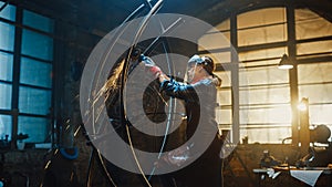 Talented Innovative Tomboy Female Artist Using an Angle Grinder to Make an Abstract, Brutal and Ex