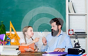 Talented pedagogue. Work together to accomplish more. Man bearded pedagogue. Homeschooling with father. Find buddy to