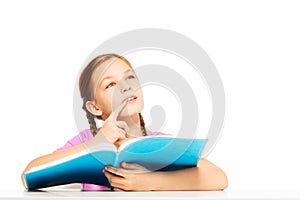 Talented schoolgirl with book in her hand