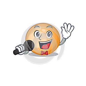Talented singer of staphylocuccus aureus cartoon character holding a microphone