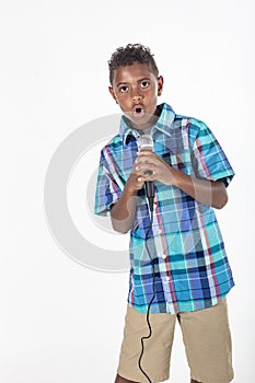 Talented young diverse singer singing into a microphone