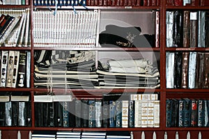 Talit, tsitsit, holy books Hebrew on the shelf. Judaism.