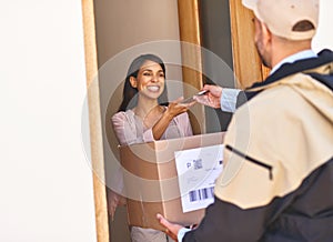 Talk about a quick and convenient service. a young woman using a digital tablet to sign for her delivery from the