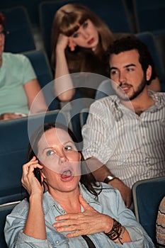 Talking Loudly In A Theater
