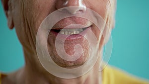 Talking old male mouth with bad teeth. Aging and retirement