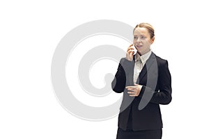 Young woman, accountant, booker in office suit isolated on white studio background photo