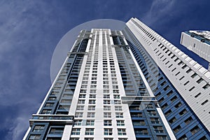 tall apartment building exterior bottom upview