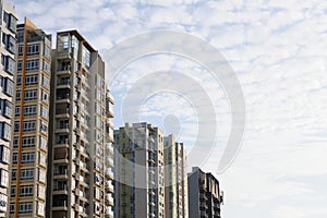 Tall apartment buildings against a horizon and skyline