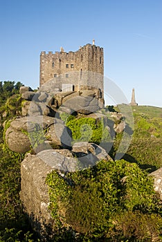 The tall Basset monument and Carn brea castle. photo