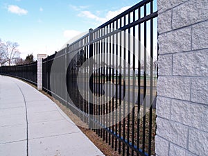 Tall black fence