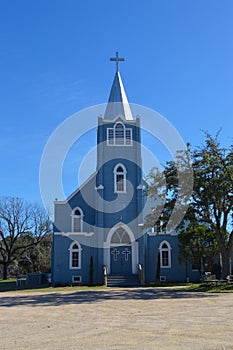 Tall Blue Church With Crosses