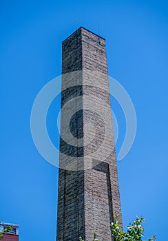 Tall brick smoke stack