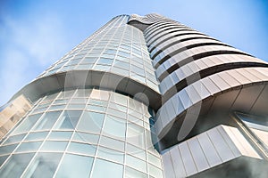 Tall building with large windows and clear sky