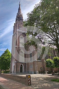 Tall catholic church in neogothic style photo