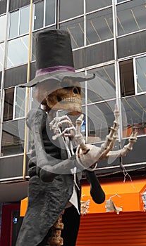 Tall catrine skeleton sculpture