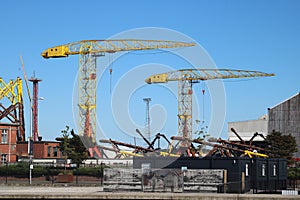 Tall cranes in shipbuilding yard