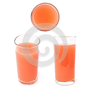 Tall glass filled with the grapefruit juice isolated over the white background