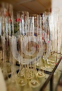 Tall glass vases for flowers. At the gift shop.