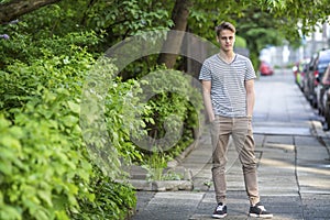 Tall guy standing on the street