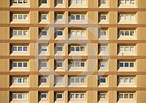 Tall high rise council flats against blue sky