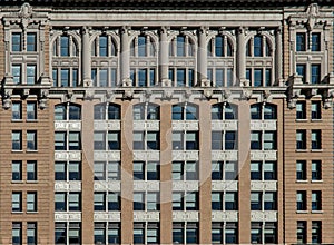 tall historic building in downtown Binghamton, NY detail (ten floor life insurance landmark skyscraper) photo