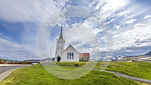 Tall historic church in Grundarfjordur town in iceland