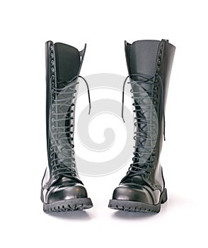 Tall knee high combat boots with screwed on soles