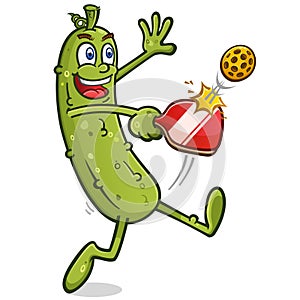 Tall pickle cartoon character hitting a pickleball underhand