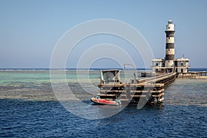 Tall lighthouse on the sea