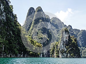 Tall limestone cliffs at Khao Sok lake