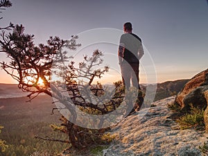 Tall man in sports clothes enjoy morning in pure nature