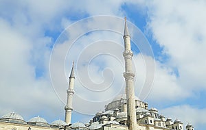 Tall minarets of the Suleman Fatih Mosque in Istanbul, Turkey.