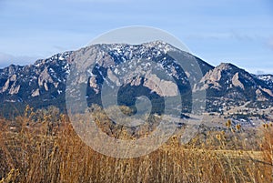 Tall Mountains Above a Field