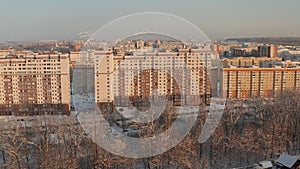 Tall new buildings in a Russian winter city. New residential areas of Penza with houses in winter. Sleeping area of the city of