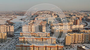 Tall new buildings in a Russian winter city. New residential areas of Penza with houses in winter. Sleeping area of the city of