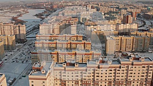 Tall new buildings in a Russian winter city. New residential areas of Penza with houses in winter. Sleeping area of the city of