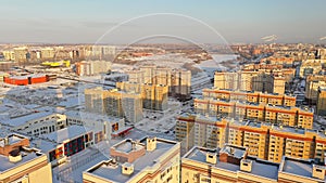 Tall new buildings in a Russian winter city. New residential areas of Penza with houses in winter. Sleeping area of the city of