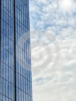 Tall office building in blue sky background