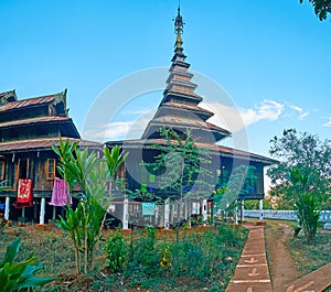 The tall pyatthat roof of Buddhist monastery, Pindaya, Myanmar photo