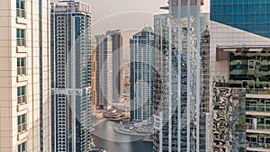 Tall residential buildings at JLT aerial timelapse, part of the Dubai multi commodities centre mixed-use district.