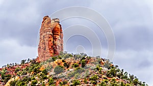 The tall sandstone butte named Chimney Rock at the town of Sedona in northern Arizona