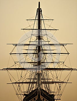 Tall ship rigging at sunrise