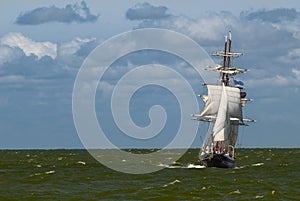 A tall ship on a stormy day