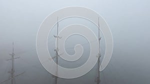 Tall ship wooden mast in fog